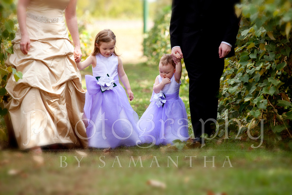 Flower girls with bride and groom at the Vineyard
