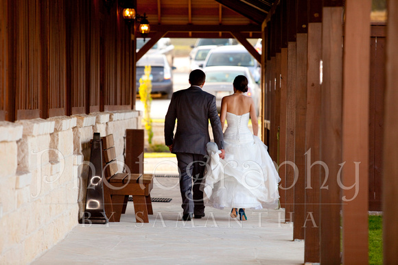 Bride and groom walking into reception near San Antonio